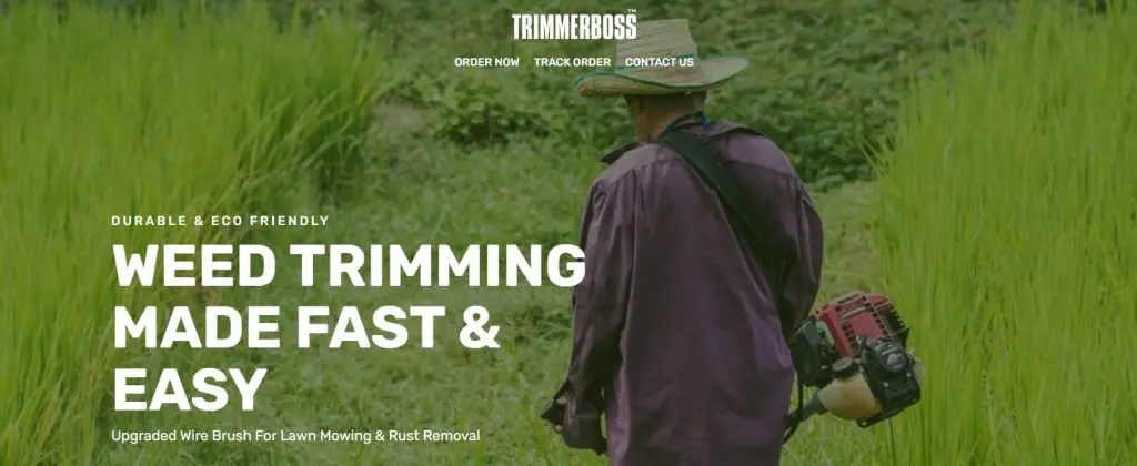 TrimmerBoss weed trimmer with person cutting tall grass in a field