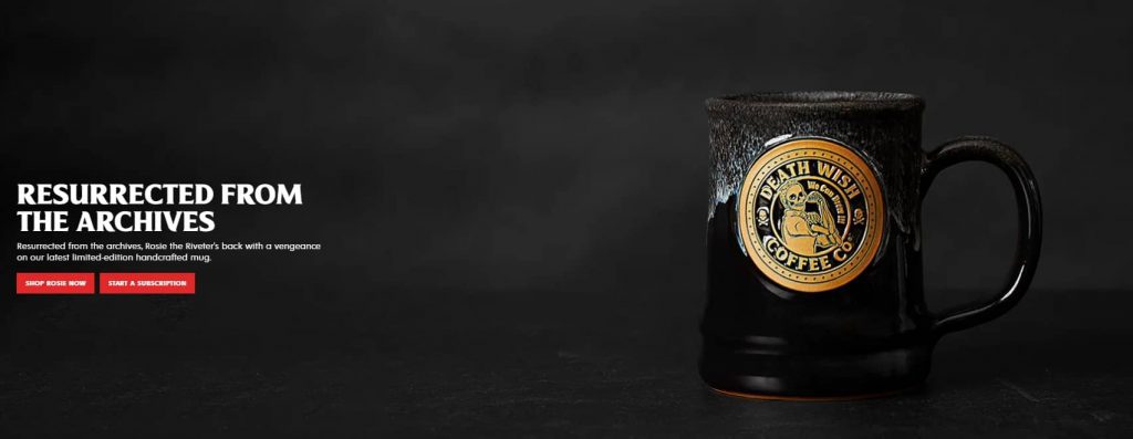 Limited-edition Death Wish Coffee mug featuring Rosie the Riveter design on a dark handcrafted cup