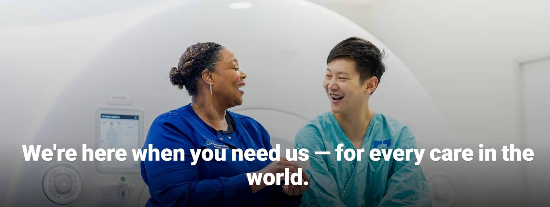Cleveland Clinic caregiver and patient sharing a smile before a medical scan, highlighting compassionate global care