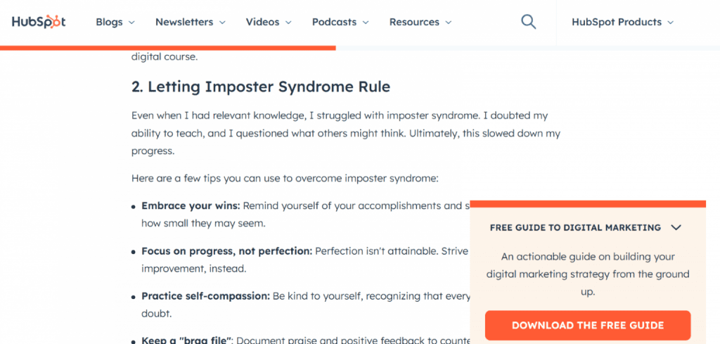 Hubspots' landing page popup for a free guide peeks from the lower right corner of the webpage.