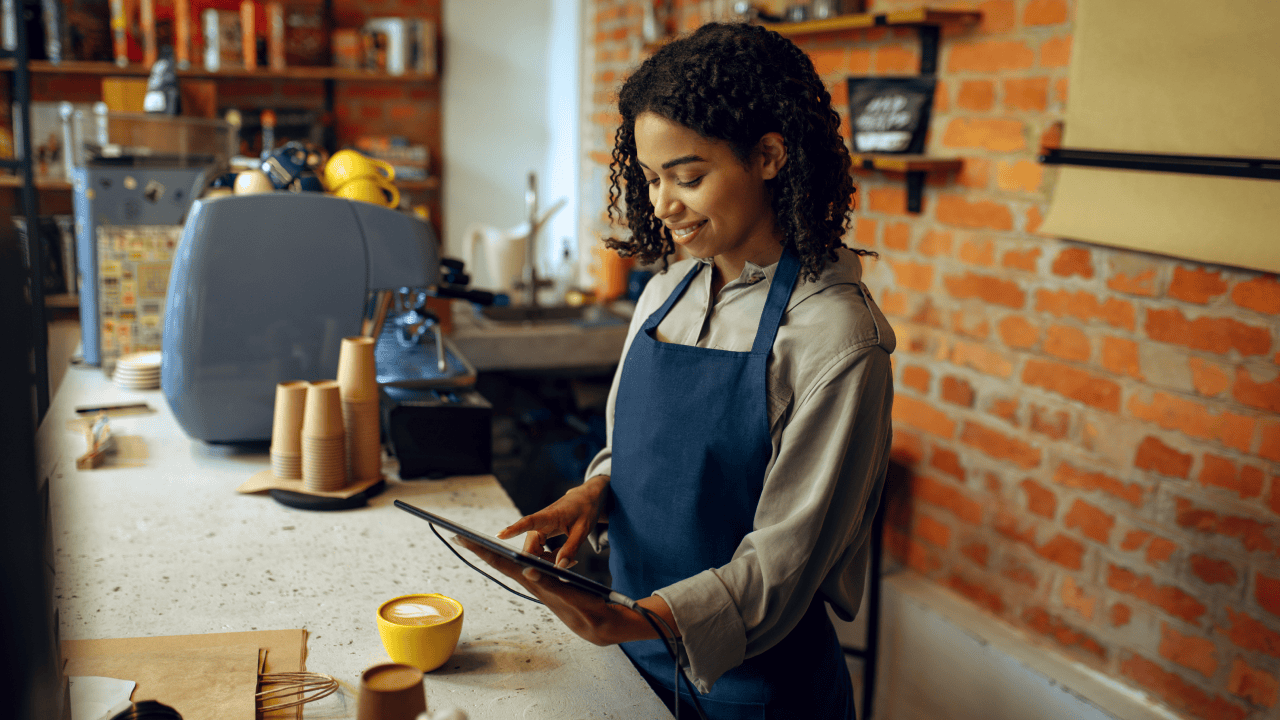 Small business owner managing her brand online with confidence.